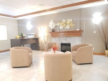 Merit Hotel & Suites
